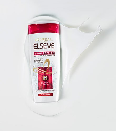 Šampon Elseve Total Repair 5 slika pakiranja u teksturi